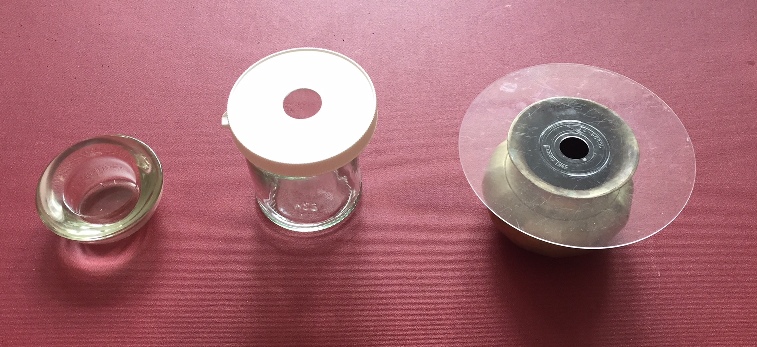 cap, CD and bottles as vases
